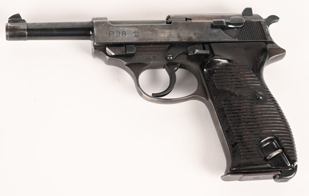 WW2 ERA WALTHER P38 SEMI AUTOMATIC PISTOL 9MM: SERIAL NUMBER: 7923a BARREL: 4 7/8" CALIBER: 9MM MANUFACTURED: 1941 Made in Germany. Metal is blue finish with standard sights. Matching frame , barrel, and slide. Correct bakelite grips and one corre