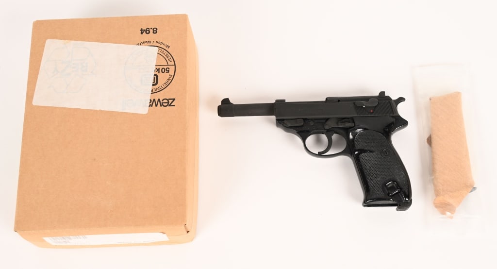 BOXED WALTHER PI MADE 12/79 SEMI AUTO PISTOL 9MM: SERIAL NUMBER: 205938W10.86. BARREL: 5". CALIBER: 9MM LUGER. MANUFACTURED: 1979. Import marked on bottom of the barrel. Germany military proofs on the slide, frame and barrel. Import marked on the