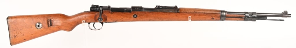 WW2 S/42 - 1936 DATE STAMPED K98 BOLT ACTION 8MM: SERIAL NUMBER: 8656 BARREL: 23 5/8" CALIBER: 7.9 ( 8MM MAUSER ) MANUFACTURED: 1936 Bridge has S/42 1936 code. (Mauser-Werke, Obemdorf on the Neckar). Pre-dates Nazi eagles. Has matching numbers on