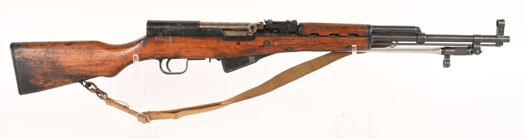 VIETNAM BRING BACK SKS TYPE 56 WITH PAPER WORK: SERIAL NUMBER 12335397 BARREL 20" CALIBER 7.62X39 MANUFACTURED 1960'S. Chinese type 56 SKS rifle captured in Republic Of Vietnam and is accompanied by Department of Defense War Trophy authorization