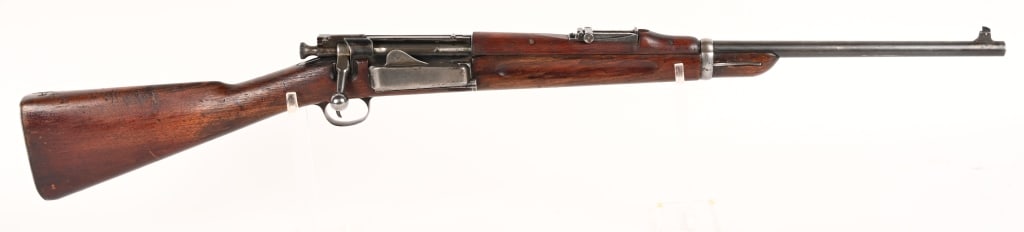 SPRINGFIELD MODEL 1896 KRAG CARBINE .30-40 CAL: SERIAL NUMBER: 46575. BARREL: 22". CALIBER: 30-40 KRAG. MANUFACTURED: 1897. Typical markings on the left side of the receiver. Pedestal blade front sight, 1800 yard rear sight ladder and on the base,