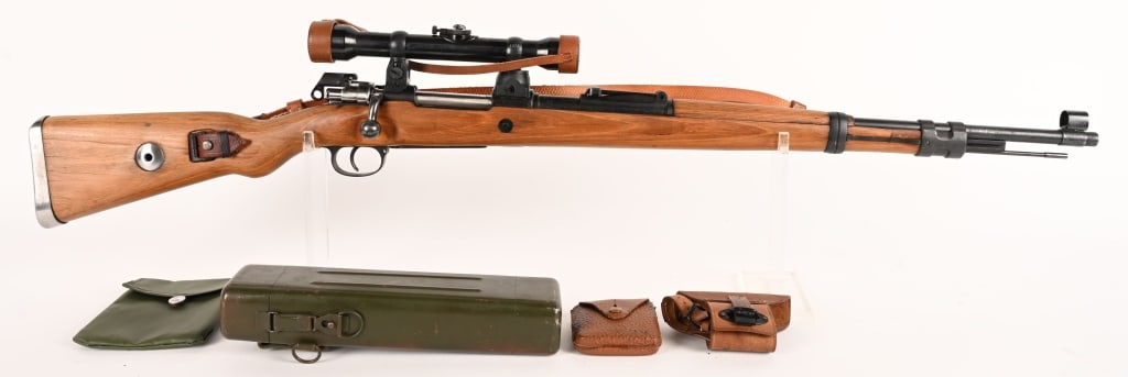 MITCHELL'S MAUSER K-98 SNIPER BOLT ACTION RIFLE: SERIAL NUMBER: 8972a BARREL: 23 5/8 CALIBER: 7.9 ( 8 MM MAUSER ) MANUFACTURED: 1940 - 1944 This is a reproduction of a German k98 sniper from WW2. Metal is blue finish steel with hooded front and