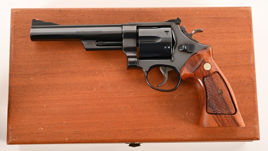 SMITH & WESSON MODEL 57 41 MAGNUM ANIB: SERIAL NUMBER: N324606 BARREL: 6"" CALIBER: .41 MAGNUM MANUFACTURED: 1975-1976. This fabulous pinned and recessed Model 57 is equipped with a 6” barrel and full target accessories. The gun is