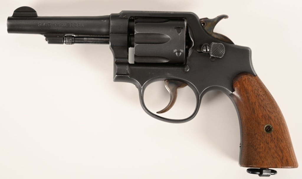 SMITH & WESSON .38 VICTORY: SERIAL NUMBER: SV775208. BARREL: 4”. CALIBER: .38 S&W. MANUFACTURED: 1944. Built during the later part of WWII this fantastic .38 Victory model is all original and fantastic, note the SV serial