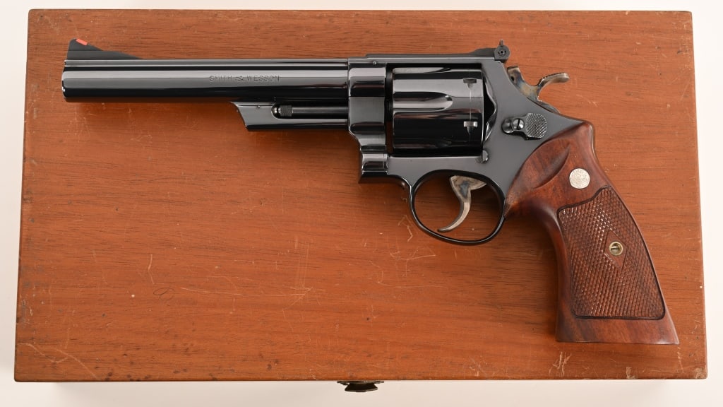 SMITH & WESSON MODEL 29 NO DASH 4-SCREW ANIB: SERIAL NUMBER: S200083. BARREL: 6 1/2”. CALIBER: .44 Magnum. MANUFACTURED: 1960. Built on the four screw N-frame this Model 29 No-Dash .44 Magnum comes complete in the mahogany presentation case