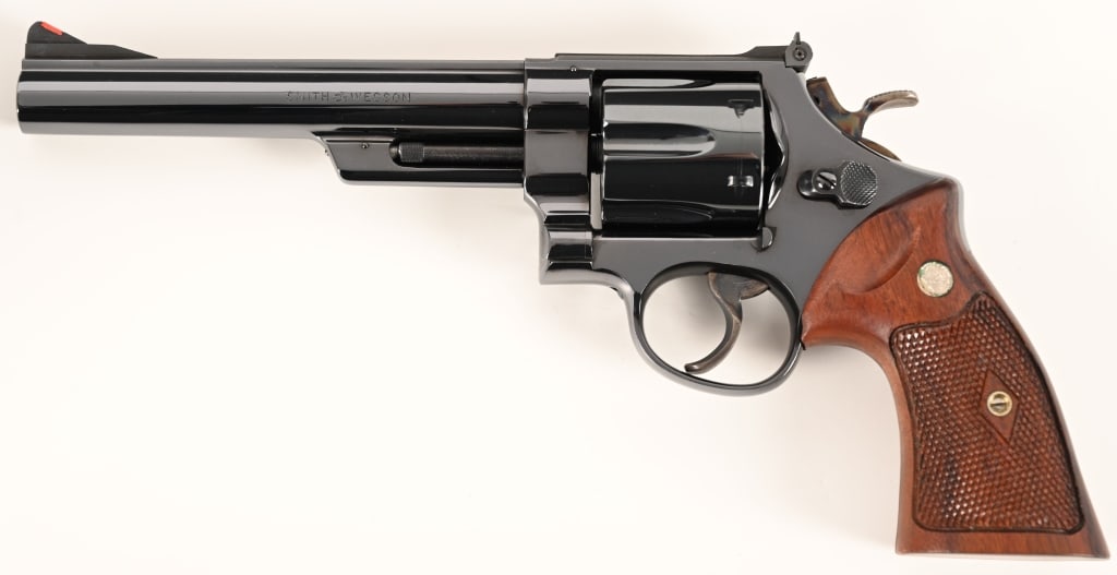 MINT SMITH & WESSON PRE MODEL 29 5-SCREW 44 MAGNUM: SERIAL NUMBER: S145344. BARREL: 6 1/2”. CALIBER: .44 Magnum. MANUFACTURED: 1956. This incredible investment grade Pre Model 29 .44 Magnum was built on the five screw frame and is equipped with a