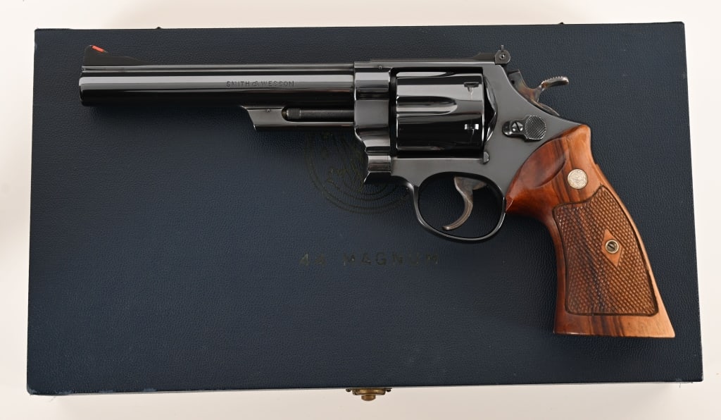 1ST 100 PRE MODEL 29 44 MAGNUM SMITH & WESSON ANIB: SERIAL NUMBER: S130948. BARREL: 6 1/2”. CALIBER: .44 Magnum. MANUFACTURED: 1956. One of the first 100 ever made this incredible investment grade Pre Model 29 .44 Magnum was built on the five scr