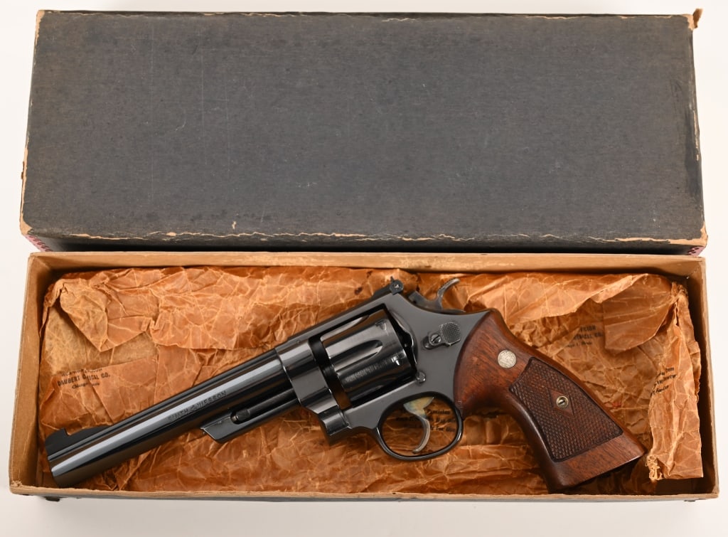 SMITH & WESSON PRE MODEL 25 ANIB 45 ACP: SERIAL NUMBER: S165375. BARREL: 6 1/2”. CALIBER: .45 ACP. MANUFACTURED: 1956. This scarce Pre Model 25 .45 Target Model of 1955 is equipped with a 6 1/2” barrel, original bright blue finis
