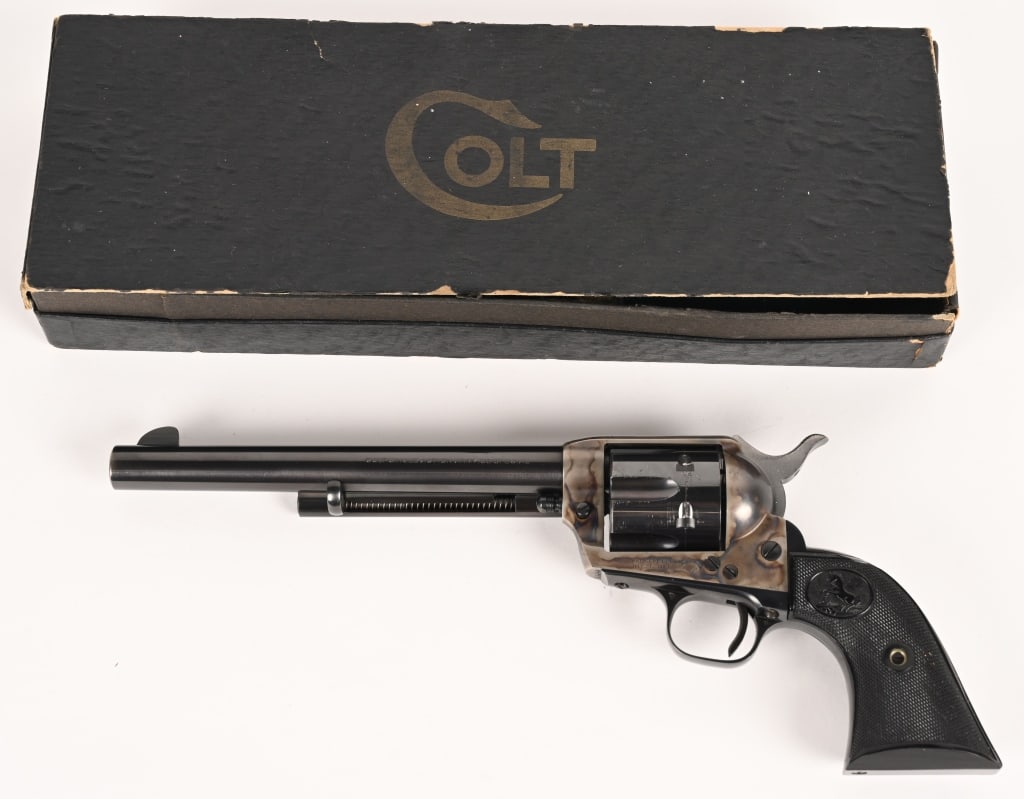 COLT SINGLE ACTION ARMY 2ND GENERATION MFG 1956: SERIAL NUMBER:7091SA BARREL: 7 1/2 ' CALIBER: 38 SPECIAL MANUFACTURED: 1956 Metal is blue finished barrel, cylinder and grip frame. Hammer is polished with checkered spur.. Frame is case colored with