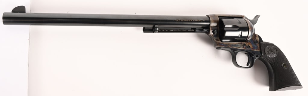 COLT 2ND GEN SINGLE ACTION BUNTLINE SPECIAL 45: SERIAL NUMBER: 18727SA BARREL: 7 1/2" CALIBER: 45 COLT. MANUFACTURED: 1958 Metal is blue finish barrel and cylinder. Frame is case color with two line paten date and rampant pony is showing. Single