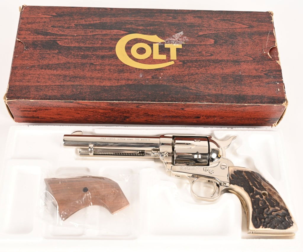 BOXED COLT SINGLE ACTION ARMY REVOLVER 357 MAG.: SERIAL NUMBER: SA34095 BARREL: 5 1/2" CALIBER: 357 MAGNUM. MANUFACTURED: 1979-1980 Made in the USA 3rd Gen. Metal is nickel finished with standard sights. Single line address on top of barrel with COL