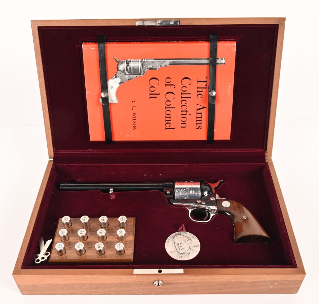 CASED COLT SINGLE ACTION ARMY 1 OF 200 SAM COLT: SERIAL NUMBER: 2143SC BARREL: 7 1/2" CALIBER: 45 COLT MANUFACTURED: 1964 Cased single action army 1 of 200 for the Sam Colt Sesquicentennial 1814 - 1964 2nd Generation. Two tone Nickel and Blue finish