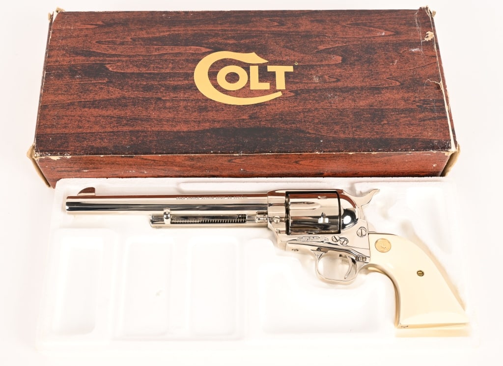 BOXED NICKEL COLT SINGLE ACTION ARMY 44 SPECIAL: SERIAL NUMBER: SA36899 BARREL: 7 1/2" CALIBER: 44 SPECIAL MANUFACTURED: 1978 - 1980 3rd Gen. Metal is bright nickel finish with standard sights. Colt's single line address on top of the barrel. COLT