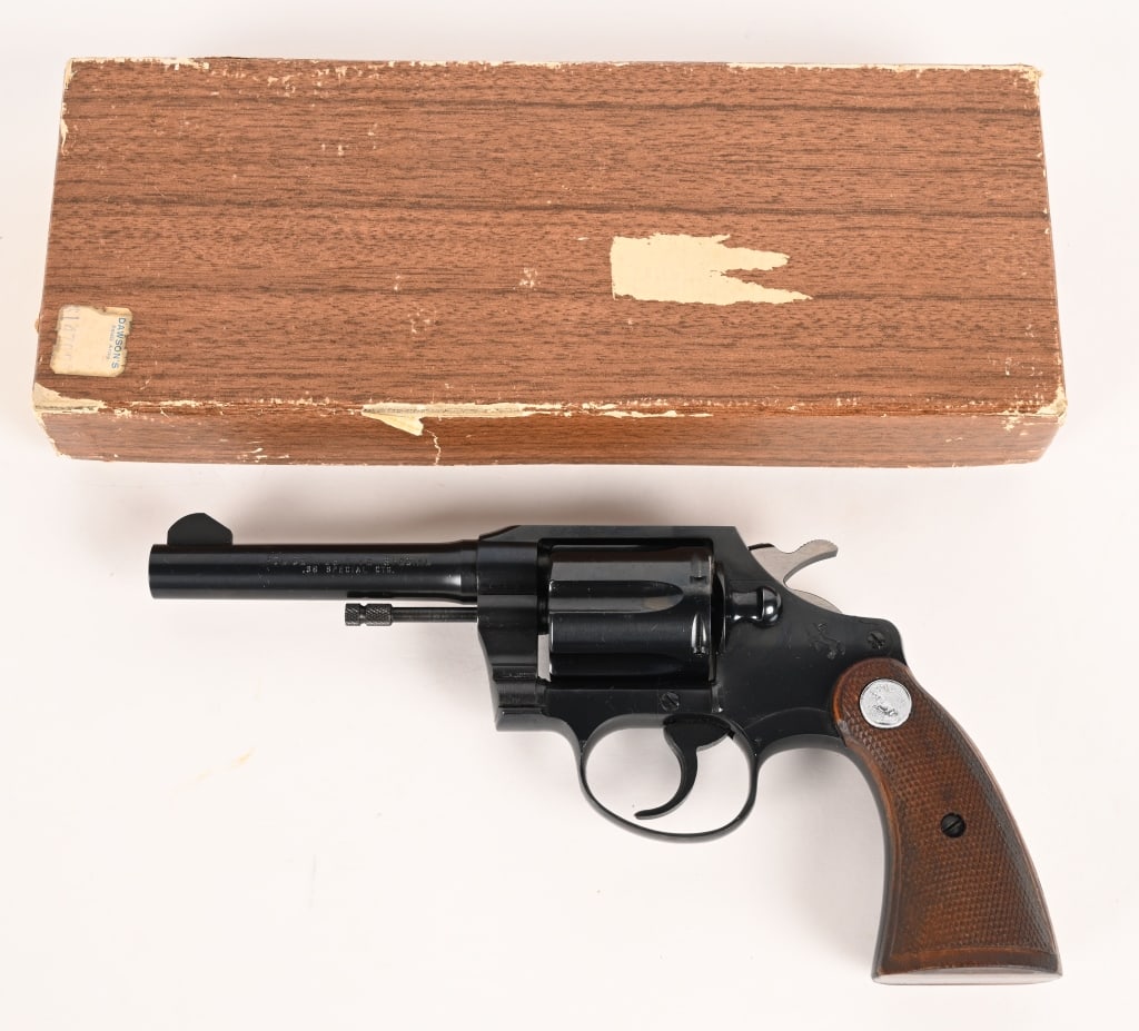 BOXED COLT POLICE POSITIVE SPECIAL 38 SPECIAL: SERIAL NUMBER: 878446 BARREL: 4" CALIBER: 38 SPECIAL MANUFACTURED: 1964 Made in USA. Metal is blue finish with blade front and square notch rear sights. Grips are checkered walnut with silver Colt