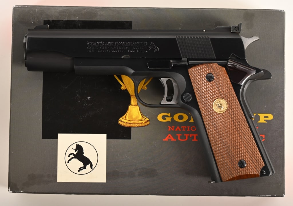 COLT GOLD CUP NATIONAL MATCH 70 SERIES: SERIAL NUMBER: 25036N70. BARREL: 5”. CALIBER: 45 ACP. MANUFACTURED: 1982. Complete in the original numbers matching two piece box with the factory paperwork and cardboard insert. Overall an