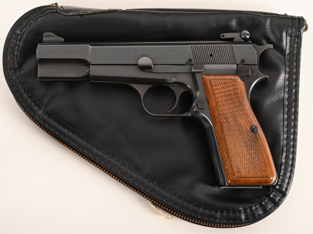 BROWNING HI POWER 9MM MFD 1971: SERIAL NUMBER: T240543. BARREL: 5”. CALIBER: 9MM. MANUFACTURED: 1971. Built in 1971 this awesome Browning Hi Power comes in the original Browning soft rug and is equipped with a 5" barrel,