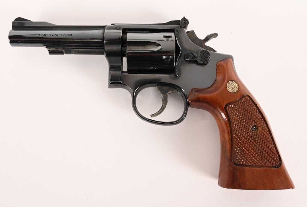 SMITH & WESSON MODEL 48-4 22 MAGNUM P&R: SERIAL NUMBER: 92K1695 BARREL: 4” CALIBER: .22 Magnum MANUFACTURED: 1981 Built in 1981 this Model 48-4 is equipped with a 4” barrel, original bright blue finish and checkered Goncalo Alves