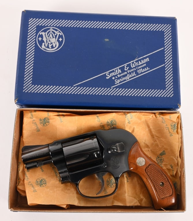 SMITH & WESSON MODEL 49 BODYGUARD: SERIAL NUMBER: 724803 BARREL: 2” CALIBER: .38 Special MANUFACTURED: 1967 This Model 49 .38 Bodyguard is equipped with a 2” barrel, original bright blue finish and checkered walnut magna