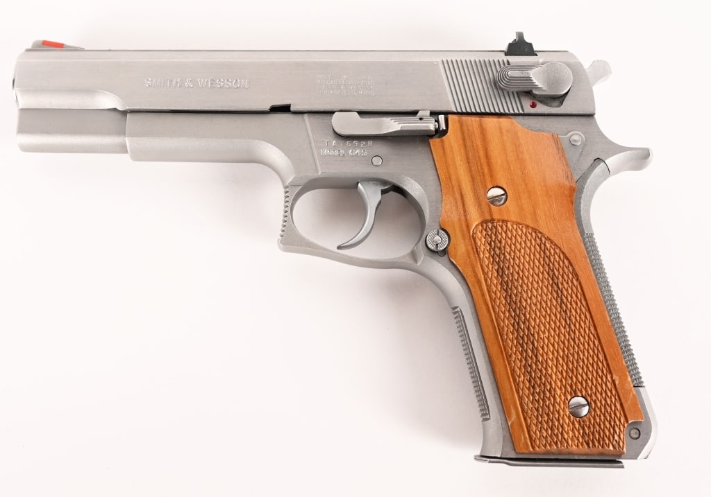 SMITH & WESSON MODEL 645 STAINLESS 45 ACP: SERIAL NUMBER: TAT6928 BARREL: 5” CALIBER: .45 ACP MANUFACTURED: 1986. This fabulous 3rd Gen S&W .45 Auto is built with a 5” barrel, stainless steel construction with red ramp front sight