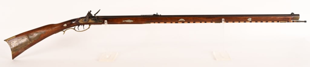 R. SOUTHGATE FULL STOCK FLINTLOCK RIFLE: SERIAL NUMBER:591, BARREL: 38", CALIBER: about..45. Contemporary flintlock rifle. Features full length octagon barrel, cherry stock, with inlays and brass hardware. Top of barrel flat marked "Geo. M.