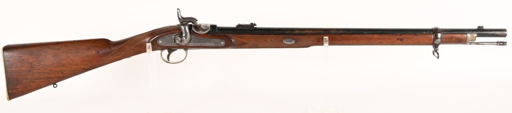 R. HUGHES 450 BORE WHITWORTH PERCUSSION RIFLE: SERIAL NUMBER: NSN. BARREL: 26 1/4". CALIBER: .450, MFG. Mid 19th Century. Lock plate engraved "R. Hughes". Barrel stamped "Whitworth Rifling - 450 Bore", with English proofs. Engraved scrollwork
