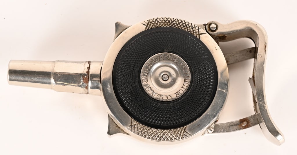 SCARCE MINNEAPOLIS FIREARMS CO. PALM PISTOL: SERIAL NUMBER:2639. BARREL: 1-3/4". CALIBER: .32 Extra short rim fire. MFG: 1890's. Nickel finished with gutta percha panels. 7 shot vertical cylinder. Patented March 6, 1883. Matching numbers on