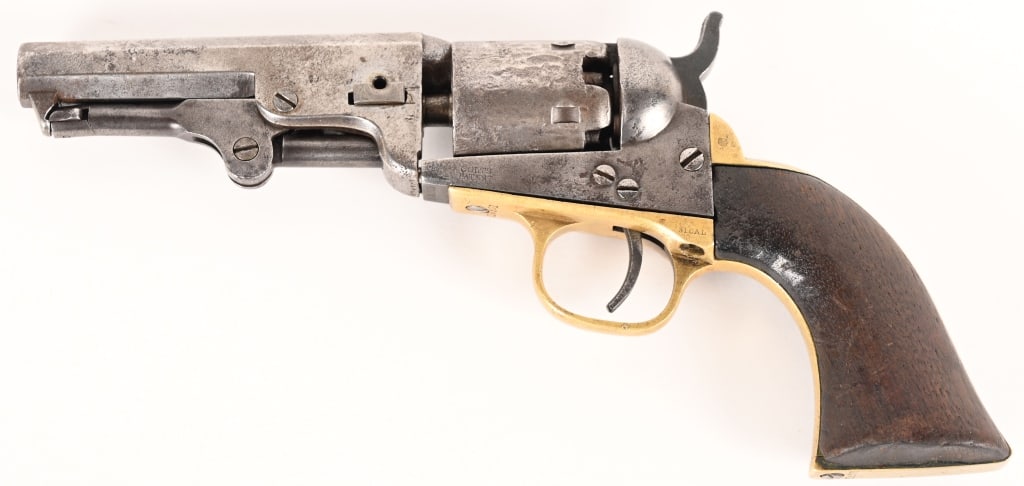 COLT MODEL 1849 PERCUSSION REVOLVER: SERIAL NUMBER: 318501, BARREL 4" CALIBER .31 PERCUSSION MANUFACTURED 1869. One line New York barrel address with Ormsby's stagecoach scene rolled on cylinder. Matching serial numbers on all parts exce