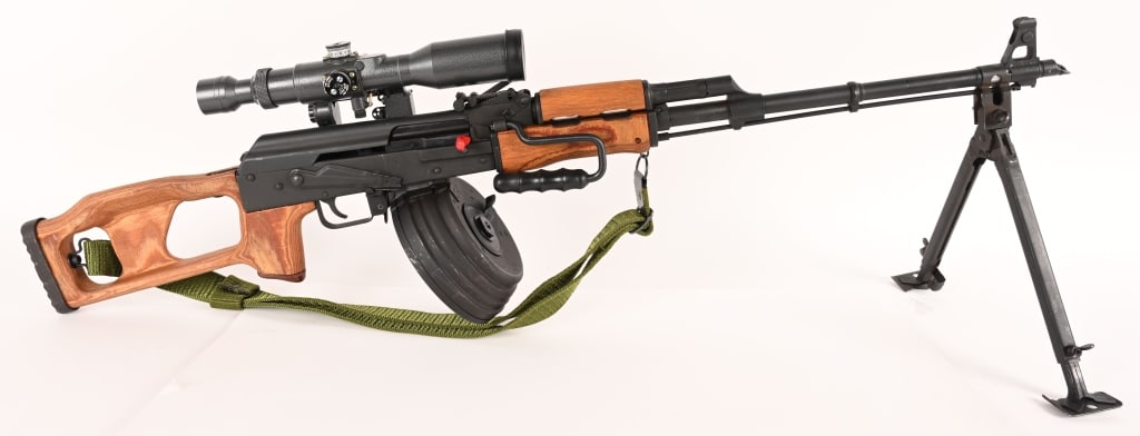 ROMANIA / CUGIR AES-10B SEMI AUTO RIFLE 7.62X39MM: SERIAL NUMBER: 110-3110-1989 BARREL: 22" CALIBER: 7.62X39MM MANUFACTURED: 1989 Import marked. Metal is phosphate finished with standard sights. Heavy barrel with bipod mounted. Laminated stock and for