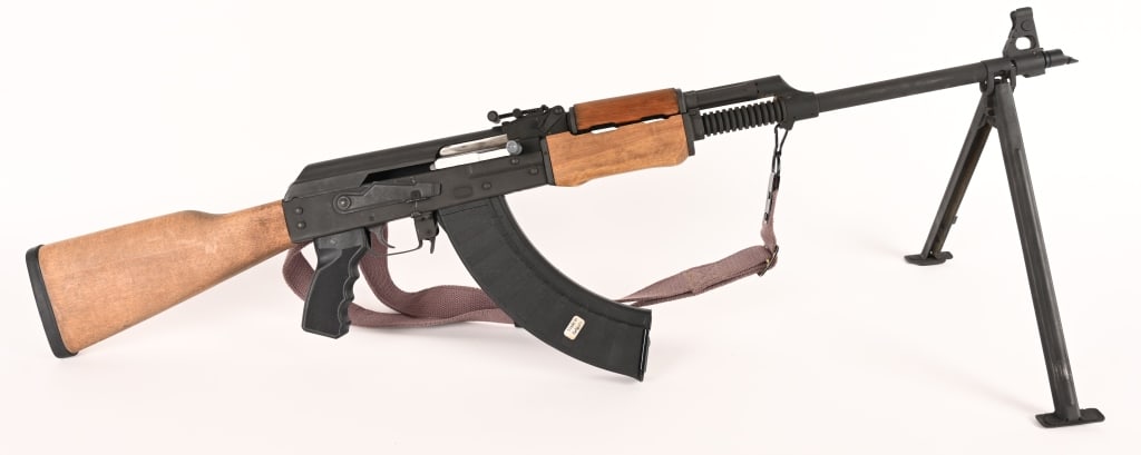 ZASTAVA - KRAGULEVAC M-72 SPORTER 7.62 X 39 MM: SERIAL NUMBER: M72-C400104 BARREL: 22" CALIBER: 7.62 X 39 MM MANUFACTURED: 1980 - 1990 Import marked. Gray phosphate finish with standard sights. Finned heavy barrel with bipod mounted. Wood stock