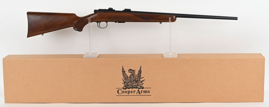 COOPER ARMS MODEL 57-M LEFT HAND BOLT ACTION 22: SERIAL NUMBER: 1152L. BARREL: 22". CALIBER: 22 LR. MANUFACTURED: 2004. The Cooper Model 57-M is a high-accuracy, bolt-action rimfire rifle known for its precision and quality craftsmanship. The rifle