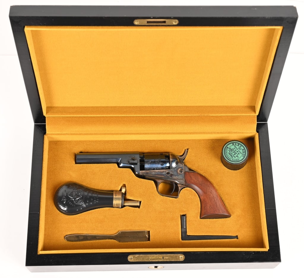 COLT BABY DRAGOON REP FACTORY CASED ANIB: SERIAL NUMBER: 00891 BARREL: 4” CALIBER: .31 BLACK POWDER MANUFACTURED: 1978. This MINT condition and sought after cap and ball Colt Baby Model Dragoon comes in the original black wooden
