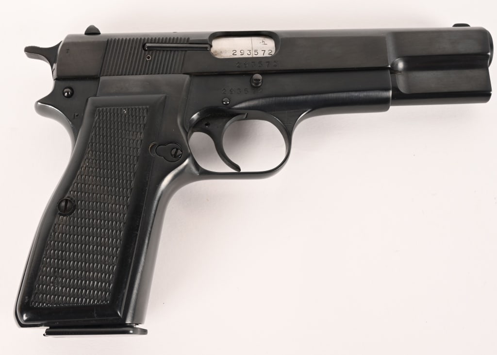 INDUSTRIA ARGENTINA FN-BROWNING HI POWER 9MM: SERIAL NUMBER: 293572 BARREL: 4 5/8" CALIBER: 9MM MANUFACTURED: 1969 - 1974 Import marked on the frame. The Industria Argentina FM Hi-Power is a high-quality, licensed clone of the Belgian Browning Hi
