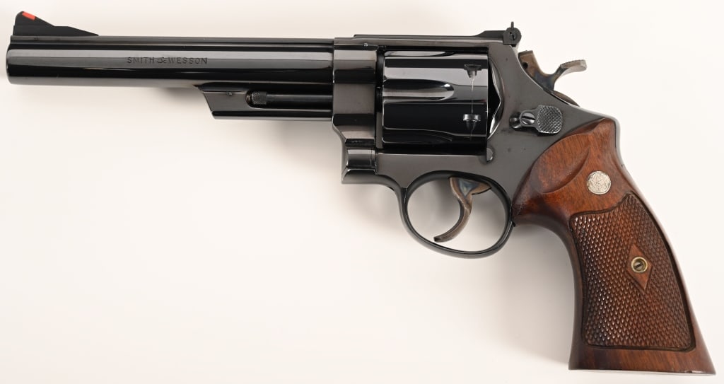 SMITH & WESSON PRE MODEL 29 .44 MAGNUM: SERIAL NUMBER: S178009. BARREL: 6 ½". CALIBER:.44 Magnum. MANUFACTURED: 1957. This Pre Model 29 was built on the four-screw N-frame and is equipped with a 6 ½" barrel, original bright blue