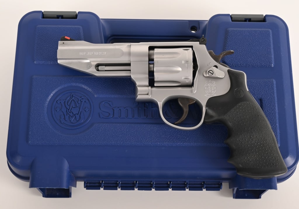 SMITH & WESSON MODEL 627-5 .357 MAGNUM: SERIAL NUMBER: CSB1681. BARREL: 4". CALIBER: .357 Magnum. MANUFACTURED: 2011. Complete in the original numbers matching blue hard case this Model 627-5 is equipped with a 4" barrel, original bead