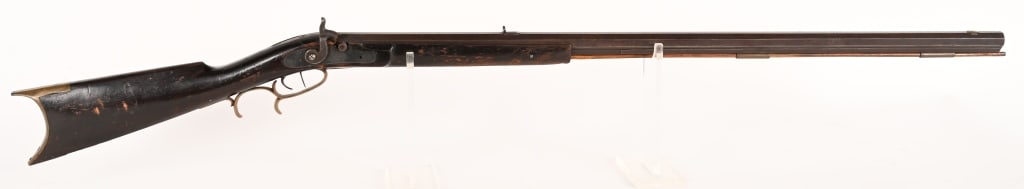 LEVI BIDDLE PERCUSSION HALF STOCK RIFLE: SERIAL NUMBER: N/A, BARREL 36". CALIBER .36. Octagon barrel marked L. Biddle on top flat. Lock marked Leman Lanctr. Pa. Walnut half stock with brass hardware. CONDITION: Fair-Good. Barrel has smooth