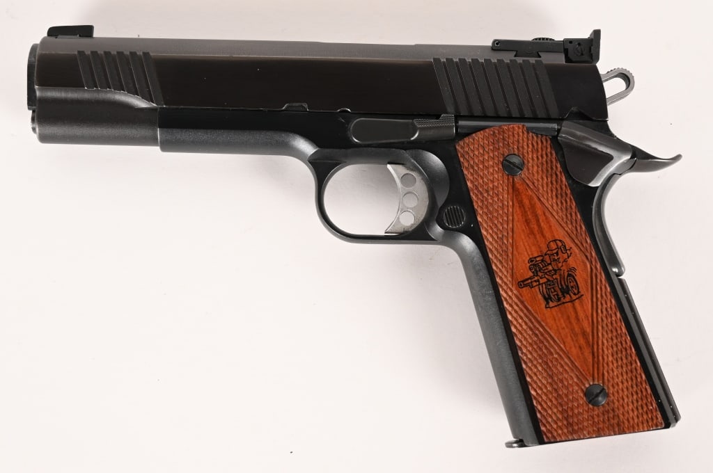 LES BAER 1911 SEMI AUTOMATIC PISTOL: SERIAL NUMBER: CMC001342. BARREL: 5". CALIBER: .45 ACP. This Baer 1911 features standard 1911 that you would expect except the fully adjustable rear sight, Baer .45 Match barrel, front and rear slide