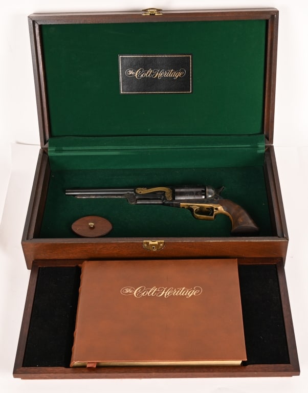 CASED COLT HERITAGE US WALKER DRAGOON REVOLVER: SERIAL 548. BARREL 9". CALIBER .44. Left side of barrel is etched and gold filled "Colt Heritage Commemorative" Modern Colt martially marked Walker revolver stamped C company on frame and military