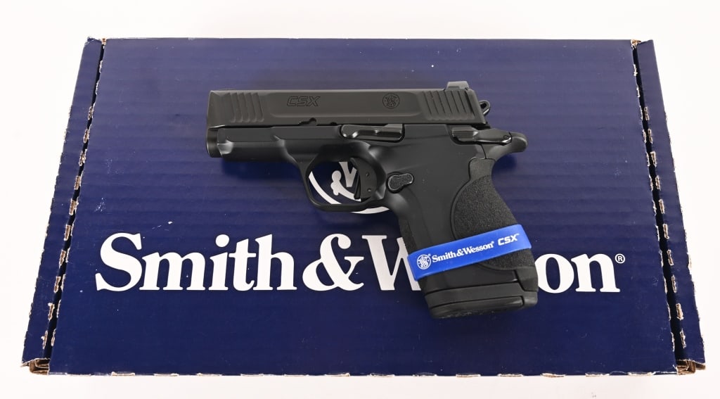 SMITH & WESSON MODEL CSX 9MM ANIB: SERIAL NUMBER: SBE 4348 BARREL: 3” CALIBER: 9 MM MANUFACTURED: 2005 This compact 9mm is complete in the original box with all the factory paperwork and equipment. CONDITION: The gun is AS-NEW