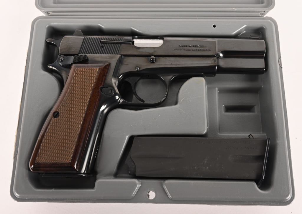 BROWNING HI POWER 9MM ANIB: SERIAL NUMBER: 511MN54499 BARREL: 5” CALIBER: 9MM MANUFACTURED: 2009. Built in 2009 this sought after Belgium made Hi Power comes in the original Browning grey hard case with all the papers and