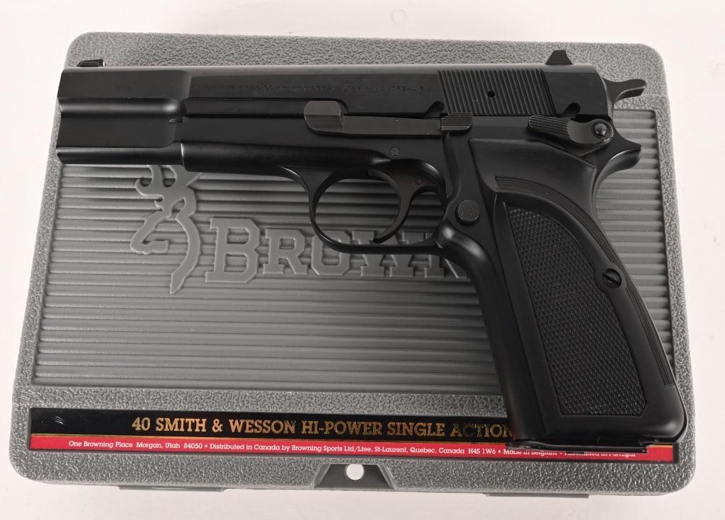 BELGIUM BROWNING HI POWER 40 S&W: SERIAL NUMBER: 513NN50434 BARREL: 5” CALIBER: 40 S&W MANUFACTURED: 2000. Built in 2000 this sought after Belgium made Hi Power comes in the original Browning grey hard case with all the papers