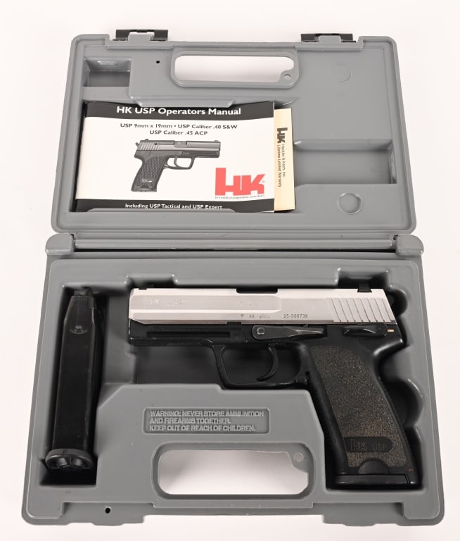 HECKLER & KOCH USP 45 ACP TWO TONE BOX: SERIAL NUMBER: 25-066738 BARREL: 4 1/4” CALIBER: 45 ACP MANUFACTURED: 2000. Built in 2000 this neat two-tone USP is complete in the original numbers matching grey hard case with all the factory