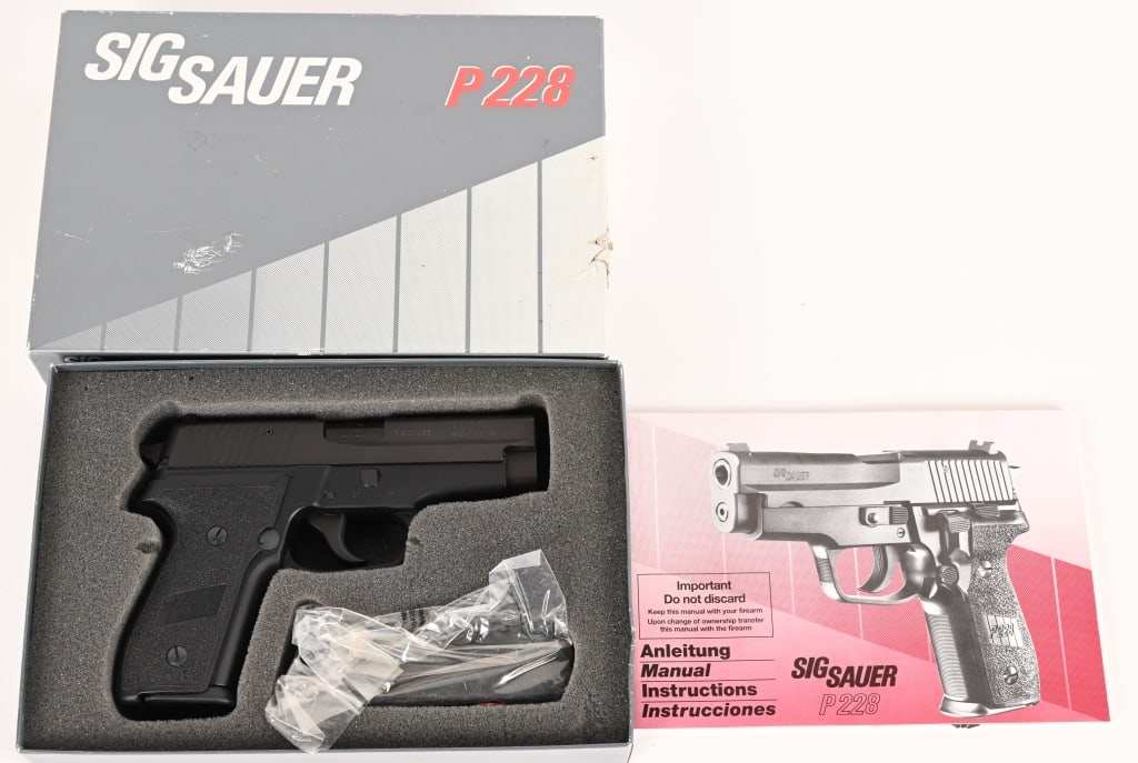 WEST GERMAN SIG SAUER P228 BOXED 9MM 1993: SERIAL NUMBER: B203499 BARREL: 3 1/2” CALIBER: 9MM MANUFACTURED: 1993. Complete in the original two piece box with all of the factory paperwork and sealed extra magazine, this fabulous West