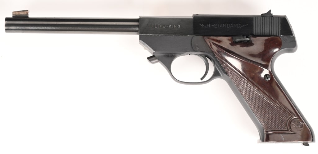 HI-STANDARD FLITE KING SEMI AUTO PISTOL 22 SHORT: SERIAL NUMBER: 627270. BARREL: 6 3/4". CALIBER: .22 SHORT. MANUFACTURED: circa 1953. This model LW-100 features blade front sight , u-notch rear and factory blued finishes. Checkered brown plastic