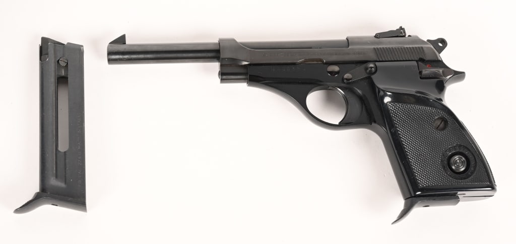 BERETTA MODEL 74 SEMI AUTO 22LR PISTOL: SERIAL NUMBER: B49935U. BARREL: 5 7/8". CALIBER: .22 LR. Made in Italy, with Italian date code and proofs on the left side of the frame. Factory sights, blued finish and black alloy frame. Original