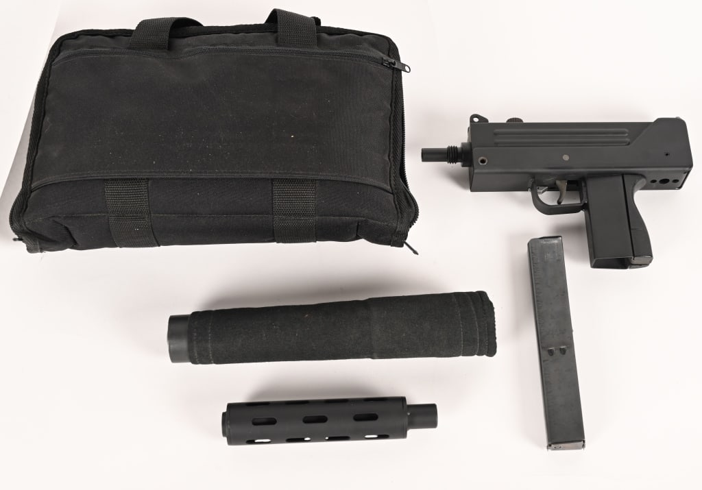 RPB INDUSTRIES MAC-10 9MM SEMI: SERIAL NUMBER: SAP94529 BARREL: 6” CALIBER: 9MM MANUFACTURED: 1985 This exciting RPB MAC-10 semi-auto is equipped with a 6" barrel, one magazine, faux suppressor barrel extender and muzzle