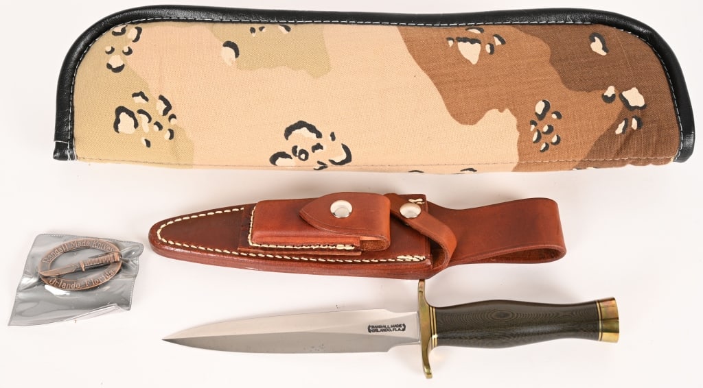 RANDALL MADE KNIFE FIGHTING STILETTO MODEL 2: BLADE: 6". OAL: 10 5/8".This is a heavily made dagger or dirk. The knife is shaped along the lines of a famous British Commando knife, but is larger, stronger, and has a more comfortable grip. Linen