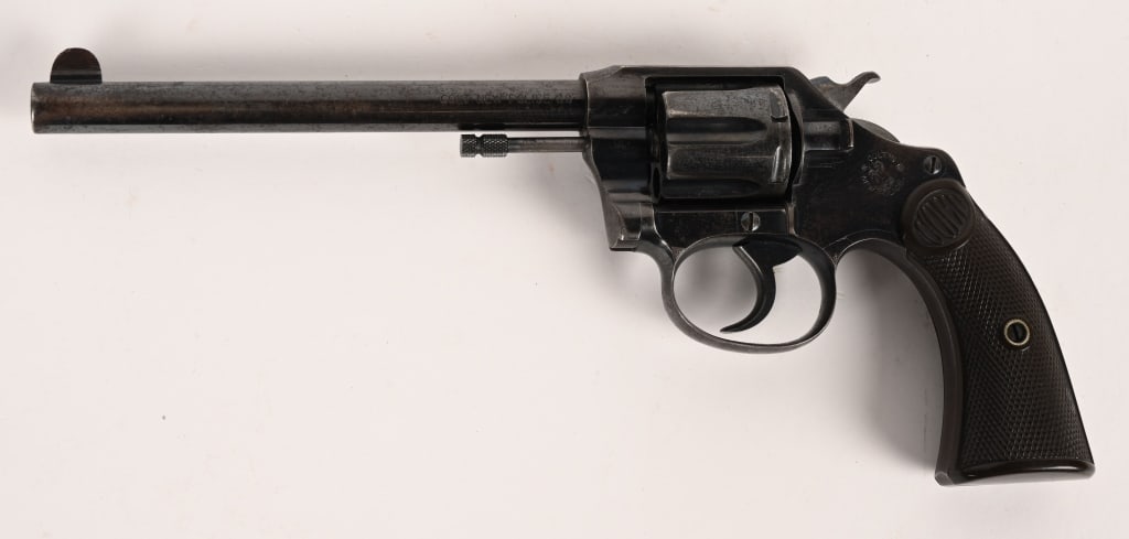 COLT NEW POLICE 32 REVOLVER: SERIAL NUMBER:48856 . BARREL: 6". CALIBER: .32. MANUFACTURED: 1907. This 6 shot gun was in the overcoat pocket of police officers in just about every city at the turn of the century. Standard gun