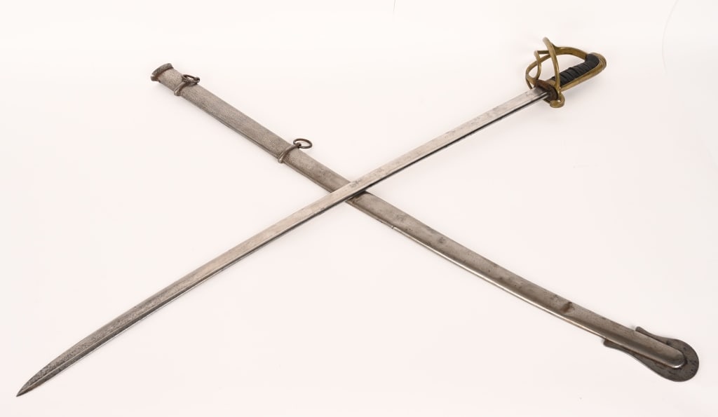 MEXICAN WAR AMES MODEL 1833 DRAGOON SWORD: Ames Model 1833 Dragoon sword with a 34" rounded quill back blade. The blade is marked N.P. Ames Cutler Springfield 1837 "TW" at the ricasso for inspector and United States. The brass hilt is snug to