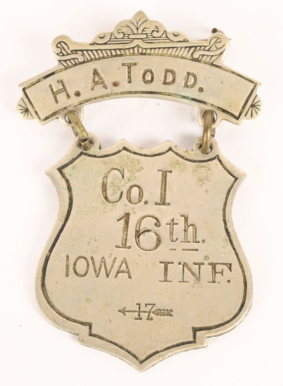 CIVIL WAR NAMED LADDER BADGE 16TH IOWA INFANTRY: An attractive Civil War Ladder badge Named to H.A. Todd of Co. I 16th Iowa Volunteer Infantry. Henry A. Todd, Residence Marion County, IA; 19 years old. Enlisted on 11/28/1864 as a Priv. On