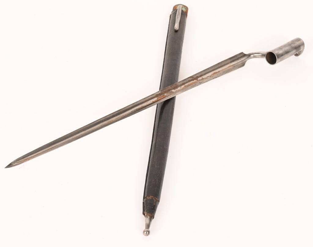 AUSTRIAN M1838 AUGUSTIN MUSKET SOCKET BAYONET: This bayonet is in very good original condition. Very good blade with light oxidation and surface and light pitting. One visible proof mark on the elbow. In its good original steel scabbard retaining